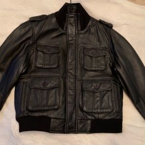 Black lambs leather jacket. Fits size 8-10. ITALY